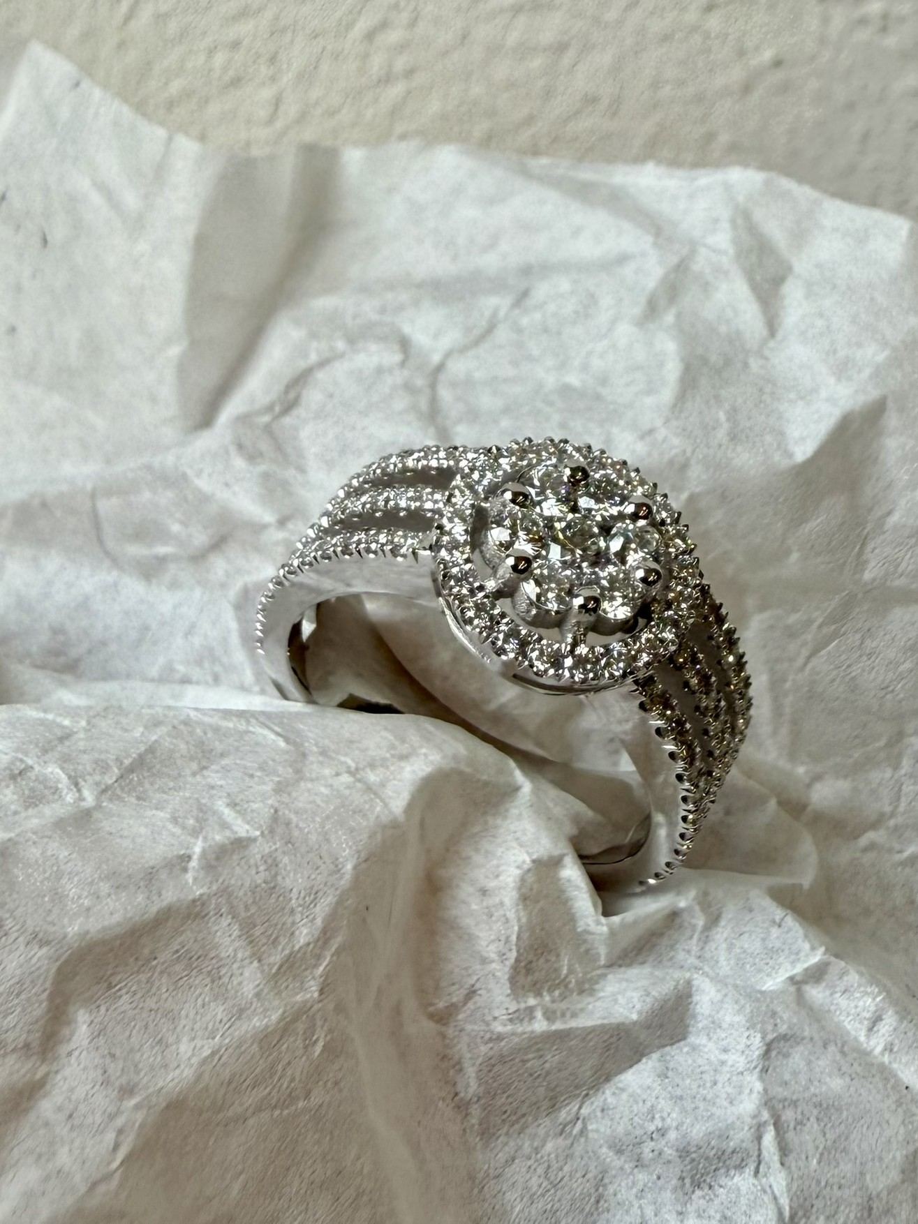 Flower ring with diamond halo setting — SKJ Serti workshop, Antwerp