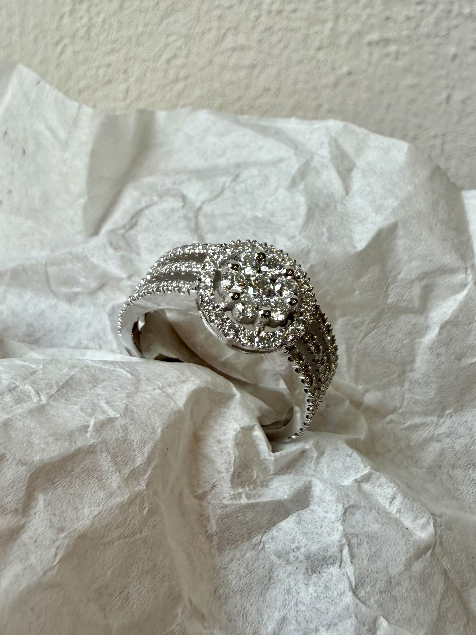 Flower ring with diamond halo setting — SKJ Serti workshop, Antwerp